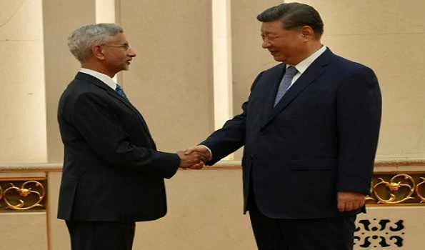 Jaishankar meets Xi, apprises him of recent development in bilateral ties