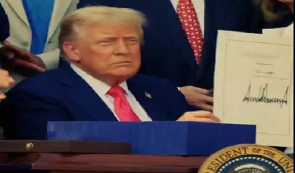 Trump signs